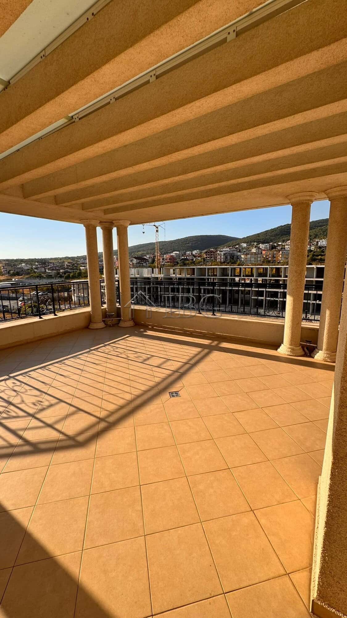 Balcony overlooking Sveti Vlas with scenic sea and mountain scenery, perfect for relaxing outdoors.
