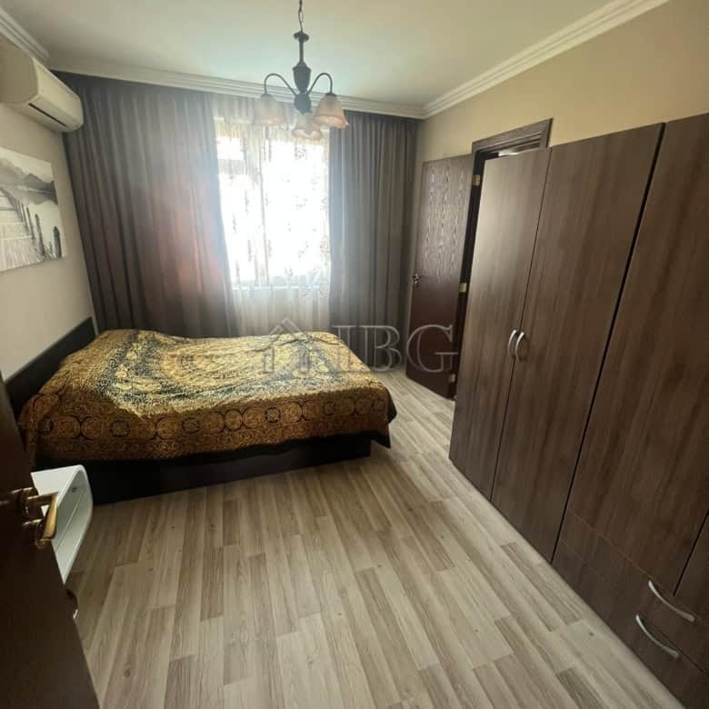 Spacious bedroom with wardrobe and natural light in Sveti Vlas apartment.