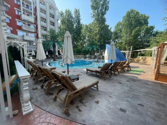 Inviting poolside view at a cozy one-bedroom apartment in Sweet Homes 6, Sunny Beach. Perfect for re.