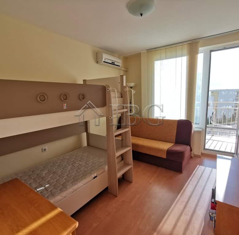 Apartment interior with balcony view in Sveti Vlas, Bulgaria.