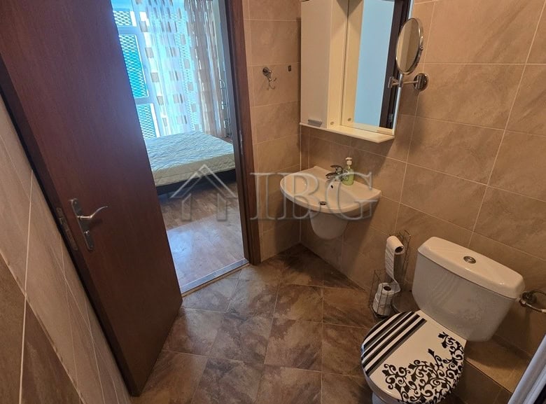 Modern bathroom in Elite 4 complex, Sunny Beach, with essential fixtures and contemporary design.
