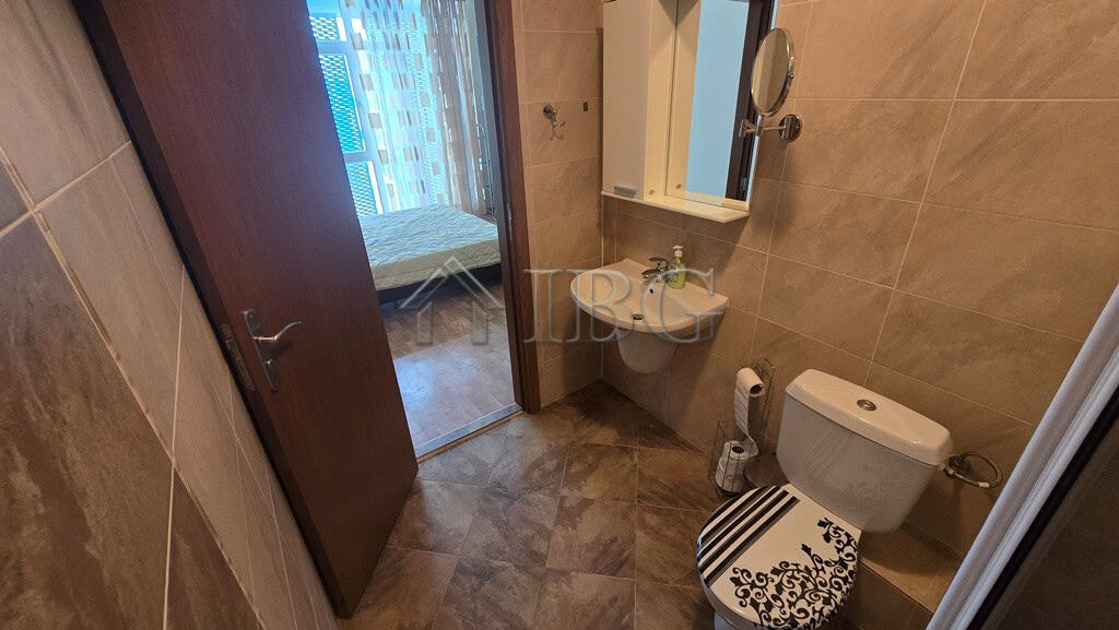 Modern bathroom in Elite 4 complex, Sunny Beach, with essential fixtures and contemporary design.