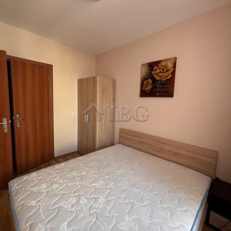 Bright bedroom with a comfortable bed and modern decor in Dawn Park, Sunny Beach.