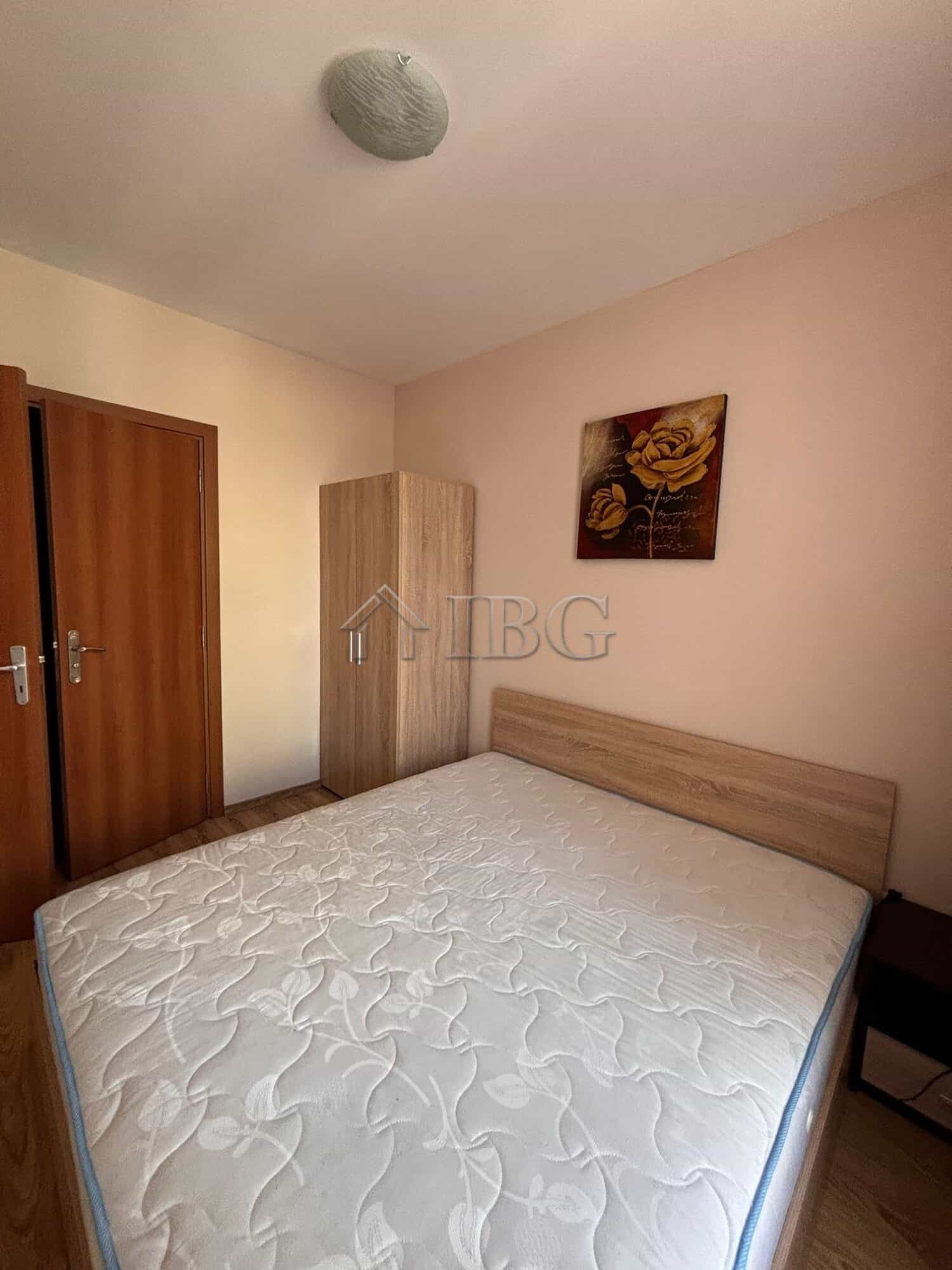 Bright bedroom with a comfortable bed and modern decor in Dawn Park, Sunny Beach.