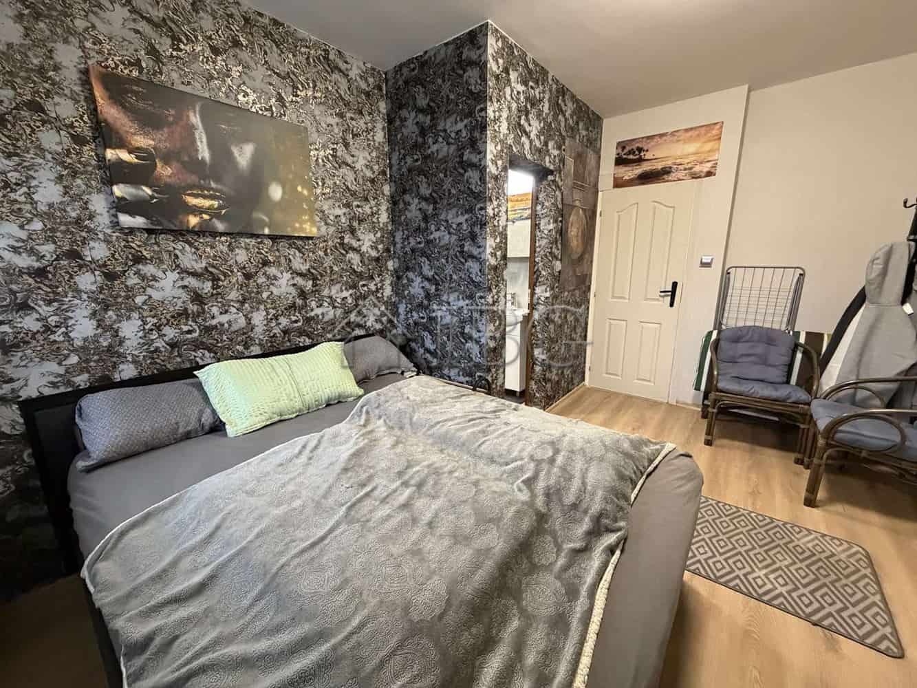 Spacious one-bedroom apartment featuring a large terrace, located in the new Grand Village complex i.