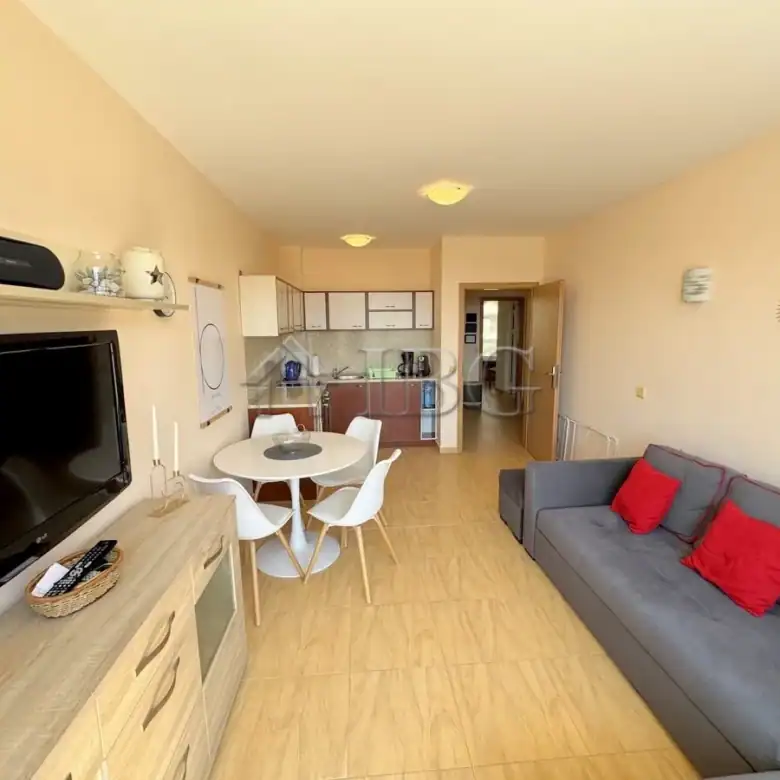 Bright living room with modern furnishings and a cozy sofa.