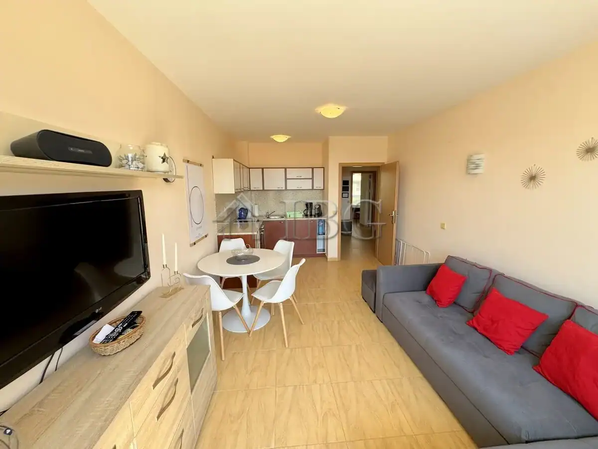 Bright living room with modern furnishings and a cozy sofa.