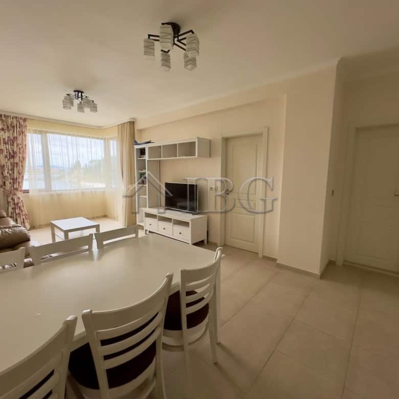 Spacious 3-room apartment with front sea view, modern interior, and balcony overlooking the beach in.