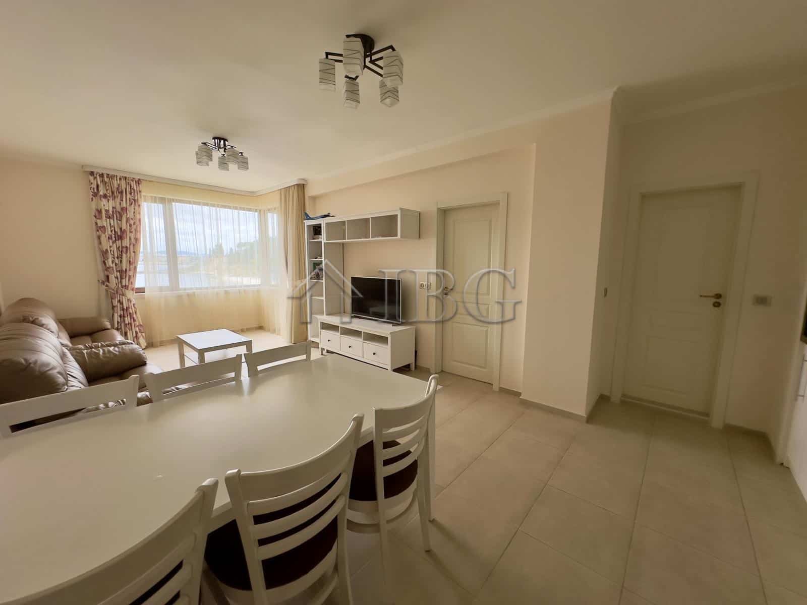 Spacious 3-room apartment with front sea view, modern interior, and balcony overlooking the beach in.