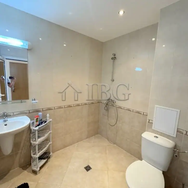 Bathroom with shower and toilet in Sveti Vlas apartment.