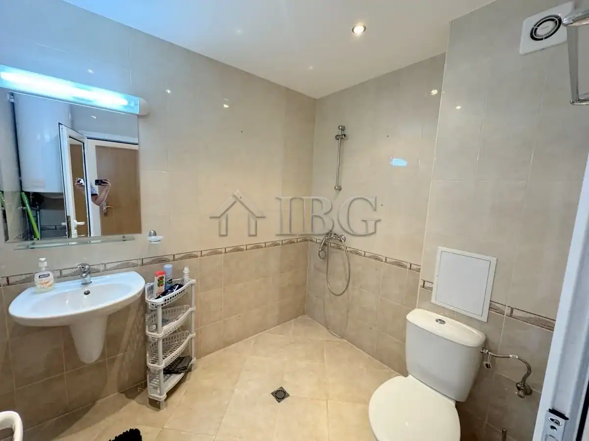 Bathroom with shower and toilet in Sveti Vlas apartment.