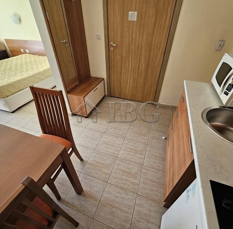 Compact studio apartment with balcony overlooking the pool at Pollo Resort, Sunny Beach.