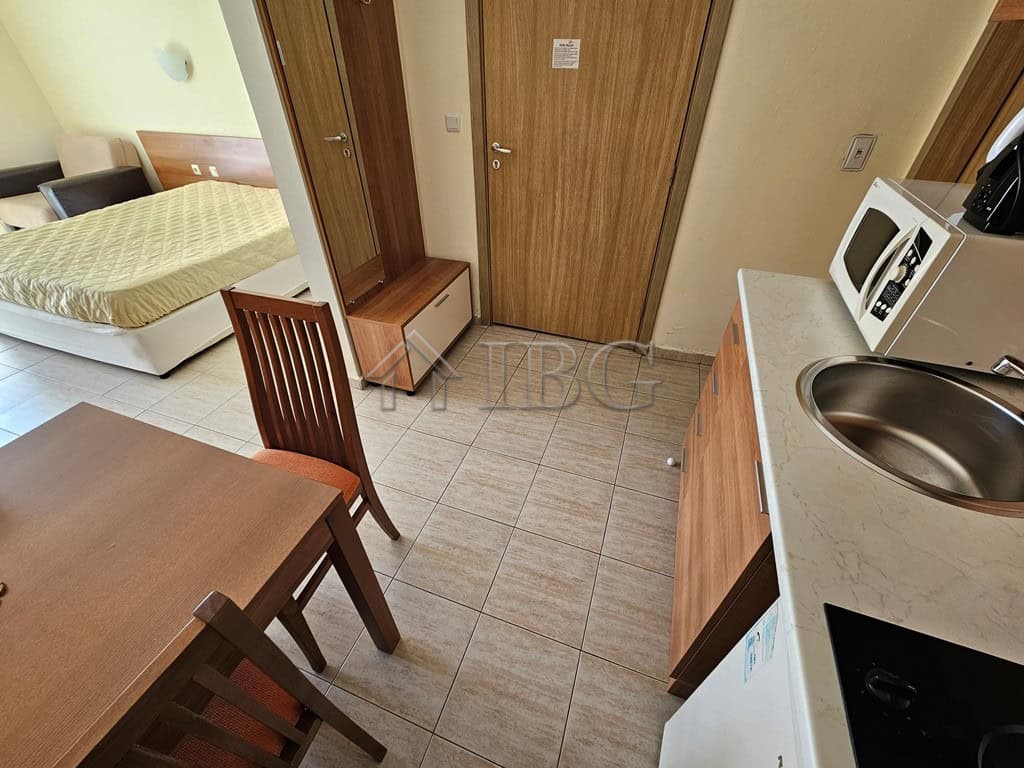 Compact studio apartment with balcony overlooking the pool at Pollo Resort, Sunny Beach.