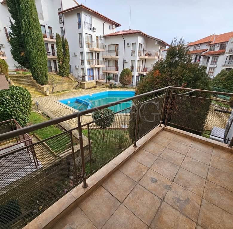 Balcony view of the pool from a 1-bedroom apartment in Dinevi Resort, Sveti Vlas.