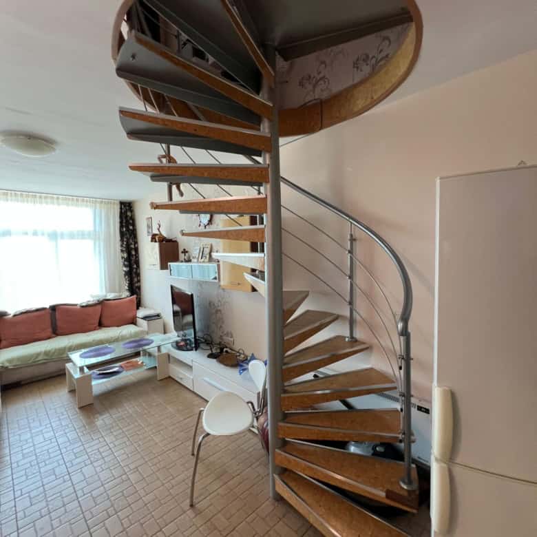 Spacious interior of a one-bedroom maisonette featuring a partial sea view in Global Villa, Sunny Be.