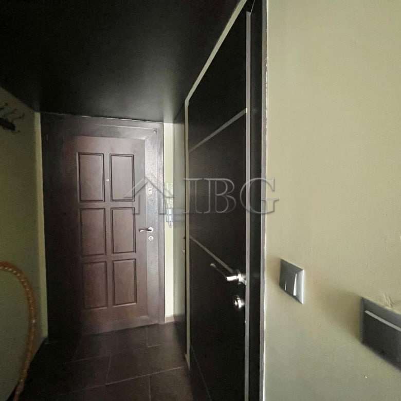 Modern apartment entrance with door and closet in Nessebar.