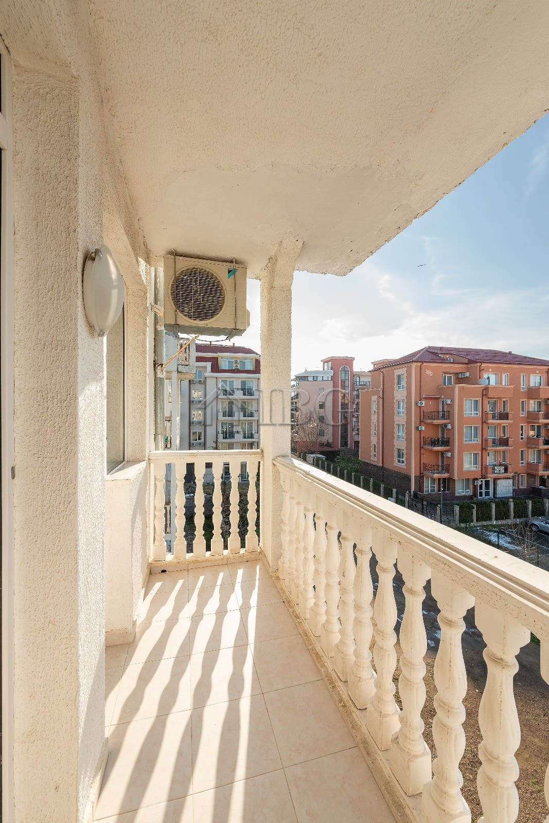 Bright balcony with pool view in renovated 2-bedroom apartment at Bravo 5, Sunny Beach.