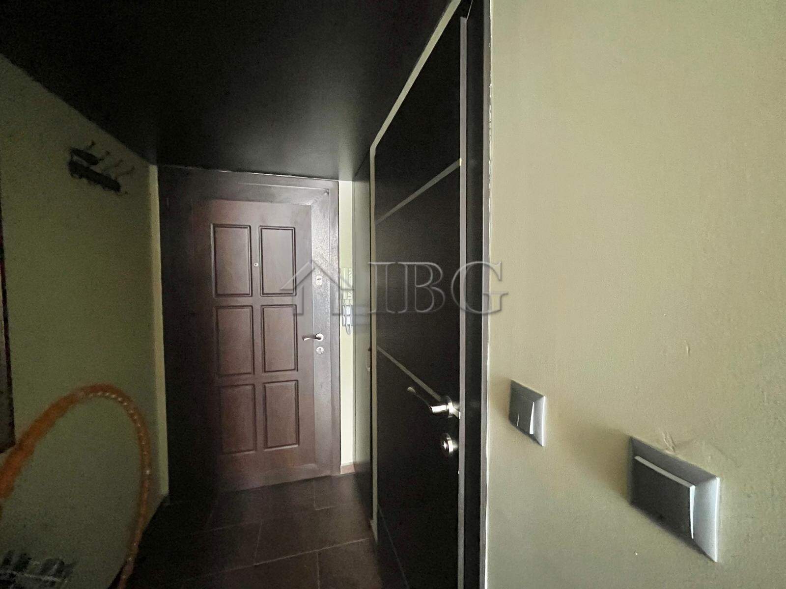 Modern apartment entrance with door and closet in Nessebar.