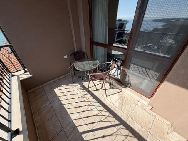 Bright balcony overlooking the sea with outdoor seating in Sarafovo. Perfect for relaxing and enjoyi.