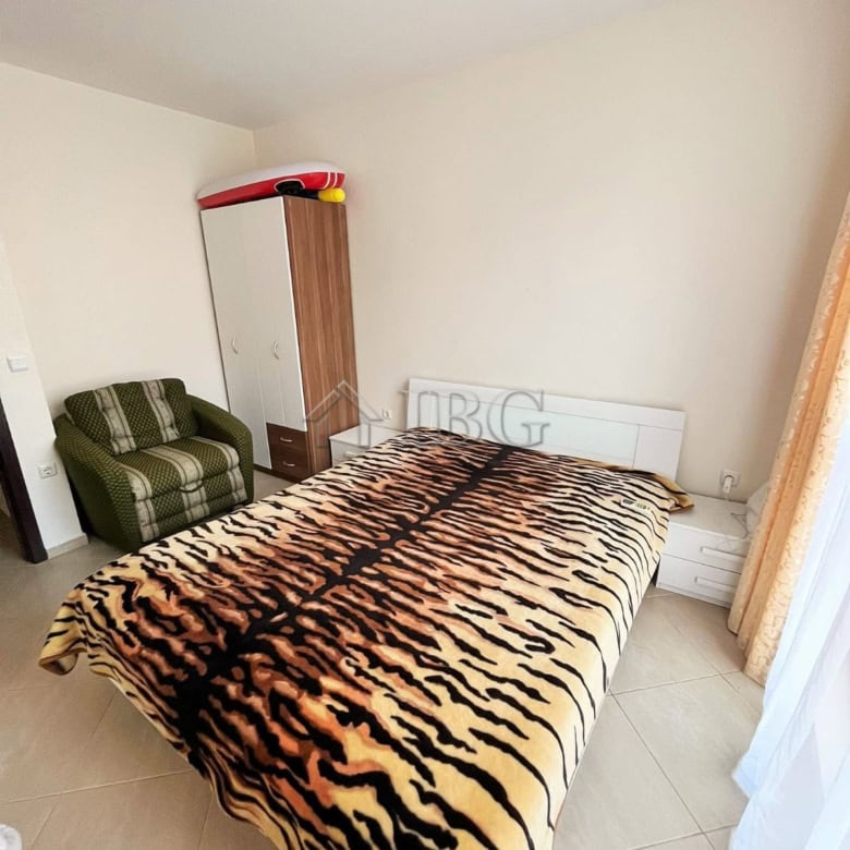 Cozy 1-bedroom apartment with tiger-print bedding in Sunny Beach, Bulgaria. Modern furnishings and b.
