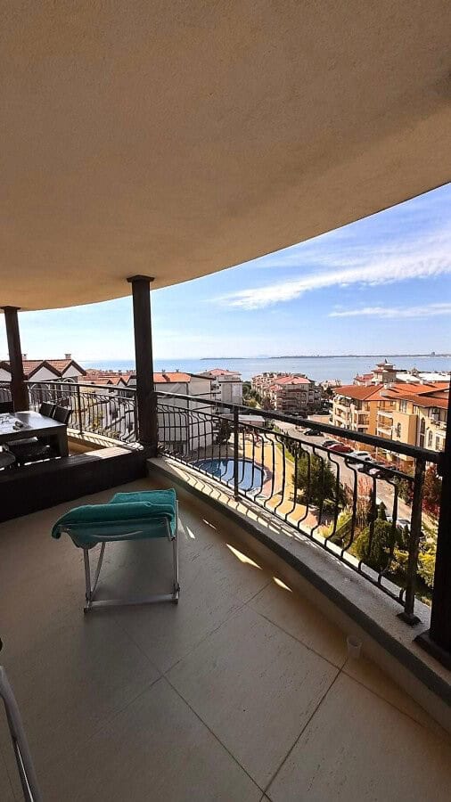 Balcony overlooking the sea and pool at Royal Palm apartment in Sveti Vlas. Enjoy stunning ocean vie.