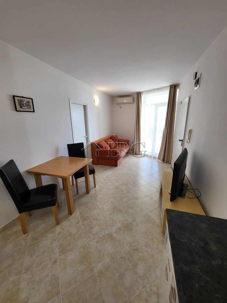 Apartment with garden access in Sunset Kosharitsa, featuring a living area, dining space, and modern.
