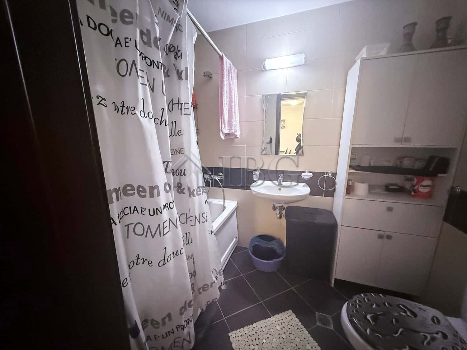 Bright bathroom with modern fixtures and storage in Amadeus Lux, Sunny Beach.