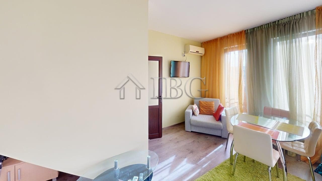 Pool view of a one-bedroom apartment with two bathrooms at Amber Beach Complex, Sunny Beach.