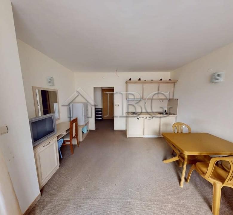 Bright living room of a one-bedroom apartment in Avalon, Sunny Beach, with modern furniture and open.