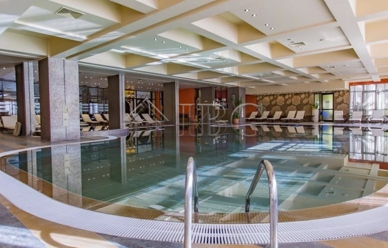 Modern indoor pool area at Royal Beach Barceló resort in Sunny Beach, Bulgaria.