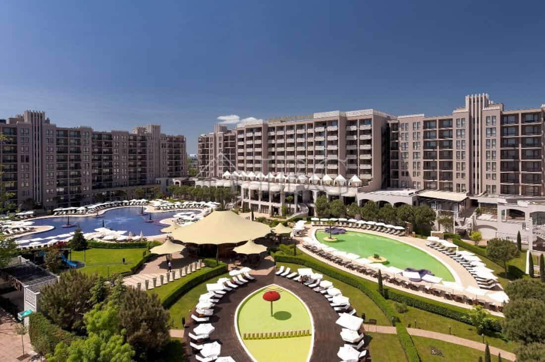 Balcony view of the Royal Beach Barceló resort with pools and lush gardens in Sunny Beach.