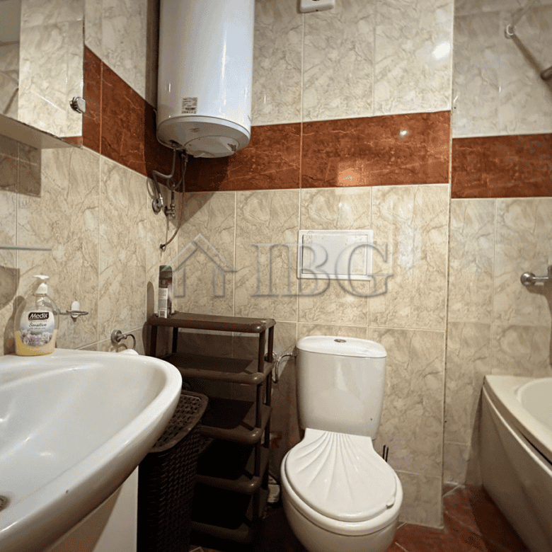 Bathroom with bathtub, toilet, and sink in Sveti Vlas property.