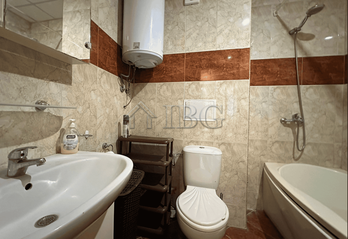 Bathroom with bathtub, toilet, and sink in Sveti Vlas property.