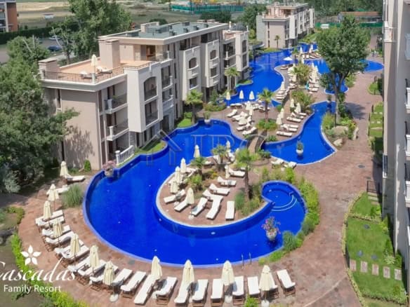 Luxurious apartment at Cascadas Family Resort with access to a stunning swimming pool and modern ame.