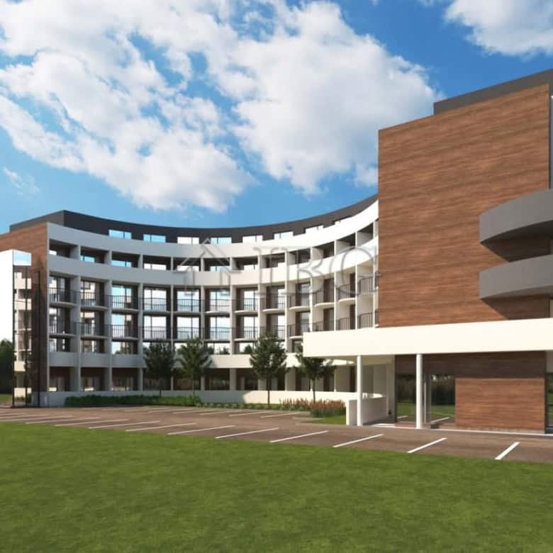 Modern residential building in a resort setting with contemporary architecture and spacious balconie.