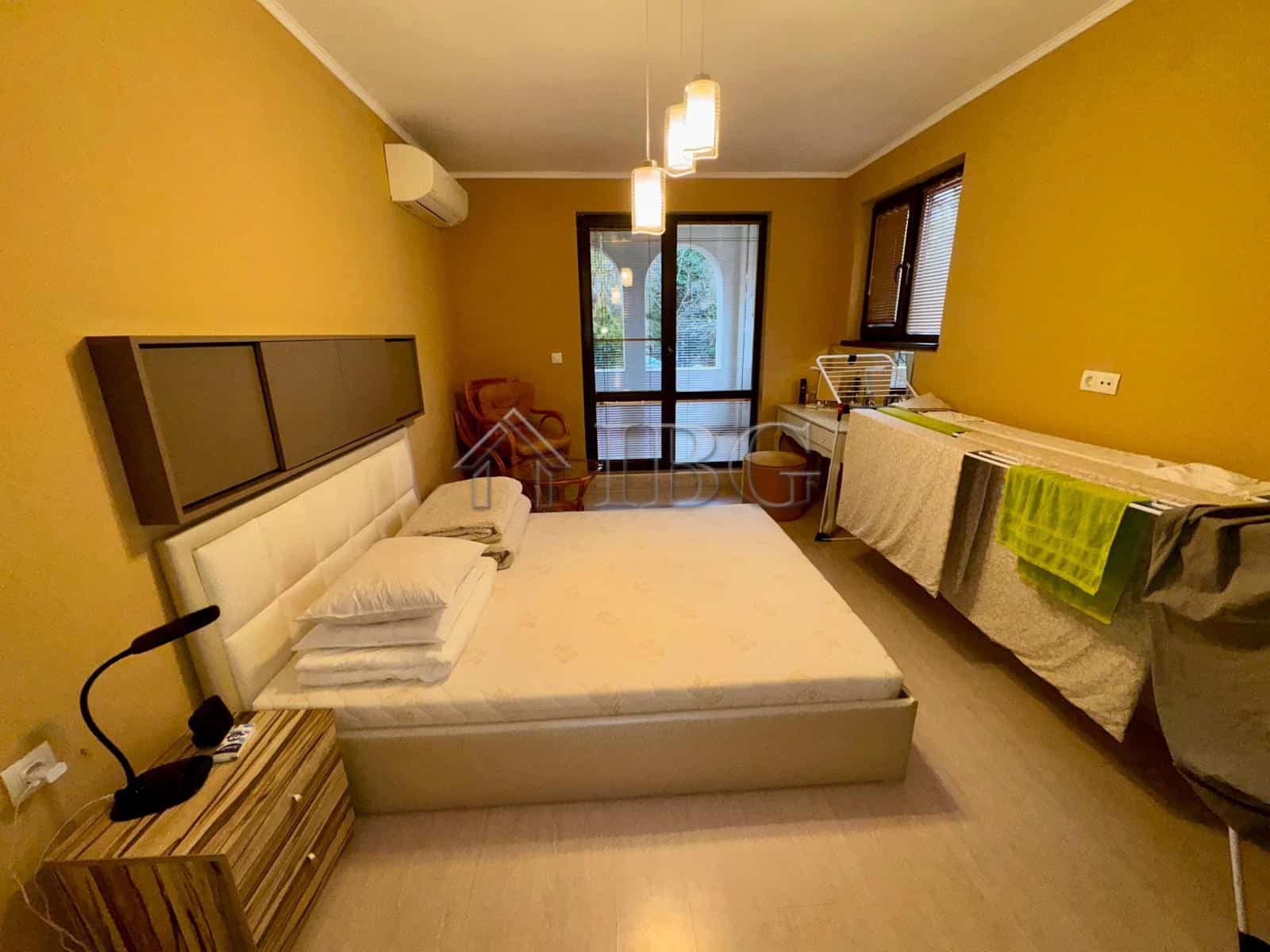 Spacious bedroom with modern decor in Esteban Complex, Nessebar.