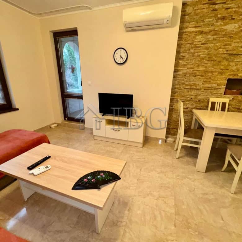 Bright living room with modern furnishings and a cozy sofa.