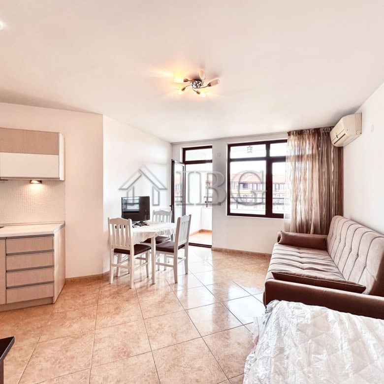 Spacious 2-bedroom apartment in Sveti Vlas with stunning sea and pool views, open-plan living area,.