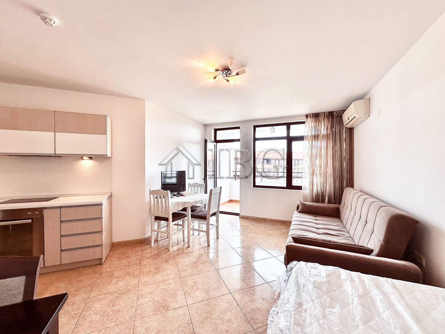 Spacious 2-bedroom apartment in Sveti Vlas with stunning sea and pool views, open-plan living area,.