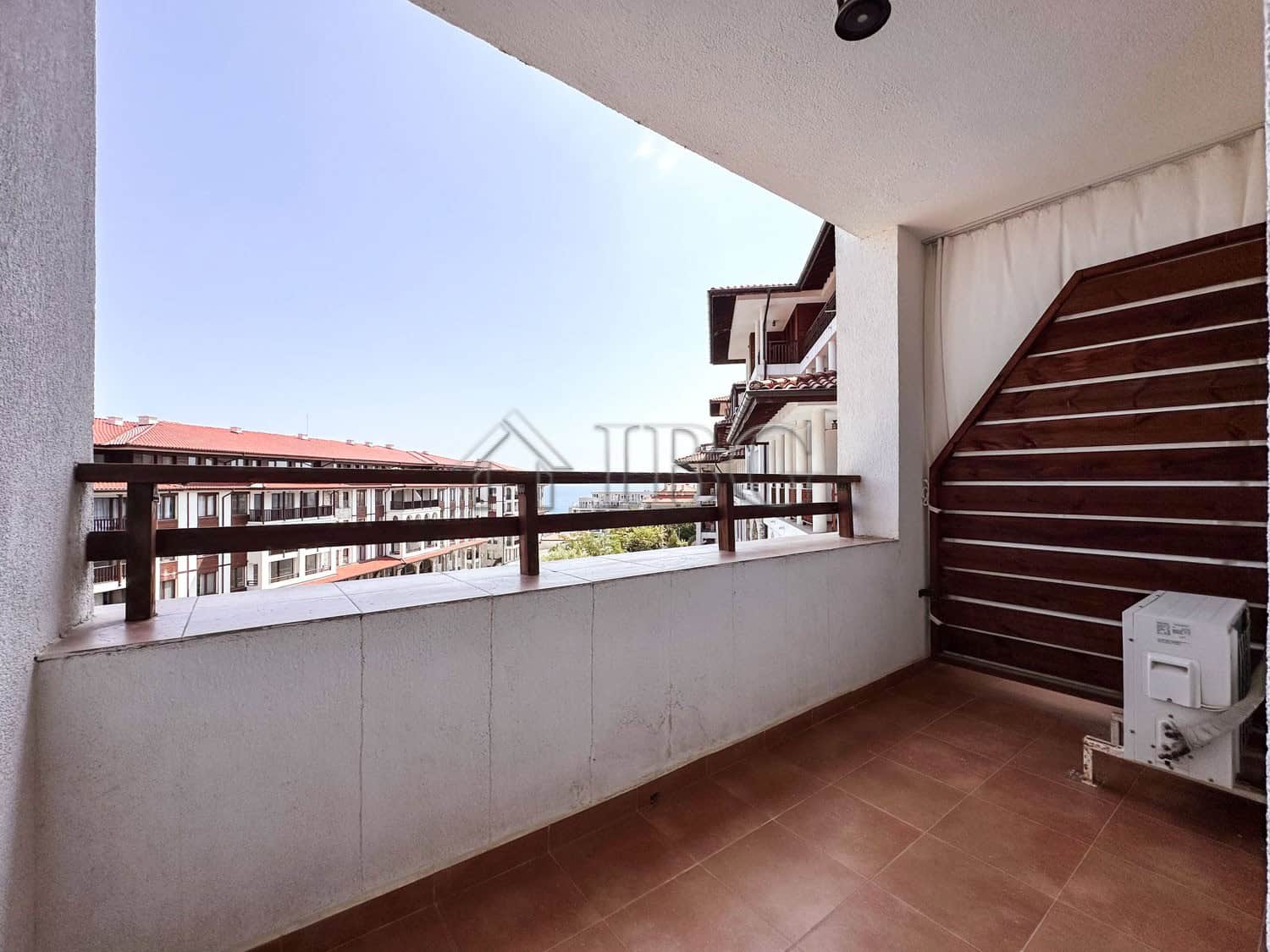 Balcony with sea and pool views in a 2-bedroom apartment at Etara 3, Sveti Vlas. Perfect for relaxin.