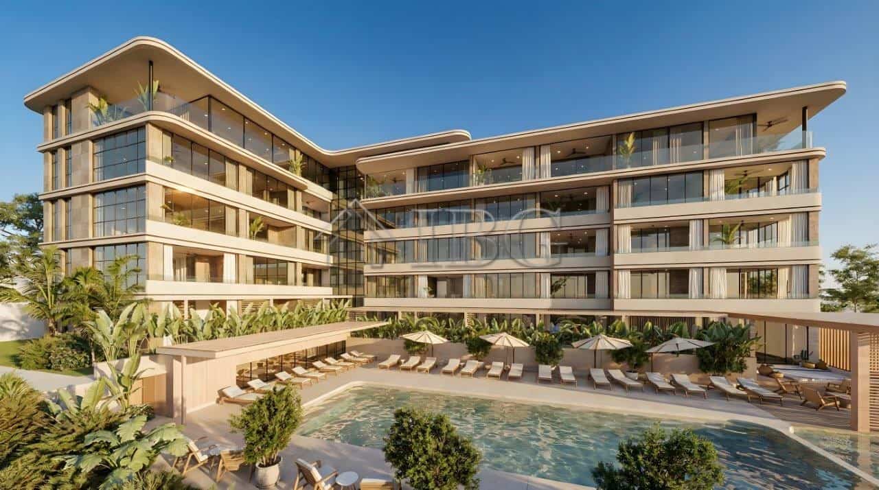 Modern loggia residences near the sea with spacious balconies and lush surroundings.