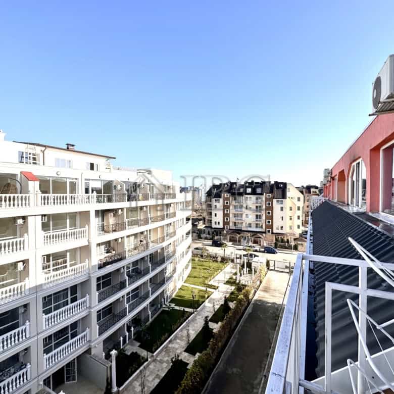 Balcony view from a studio apartment in Gerber 4, Sunny Beach, overlooking neighboring buildings and.
