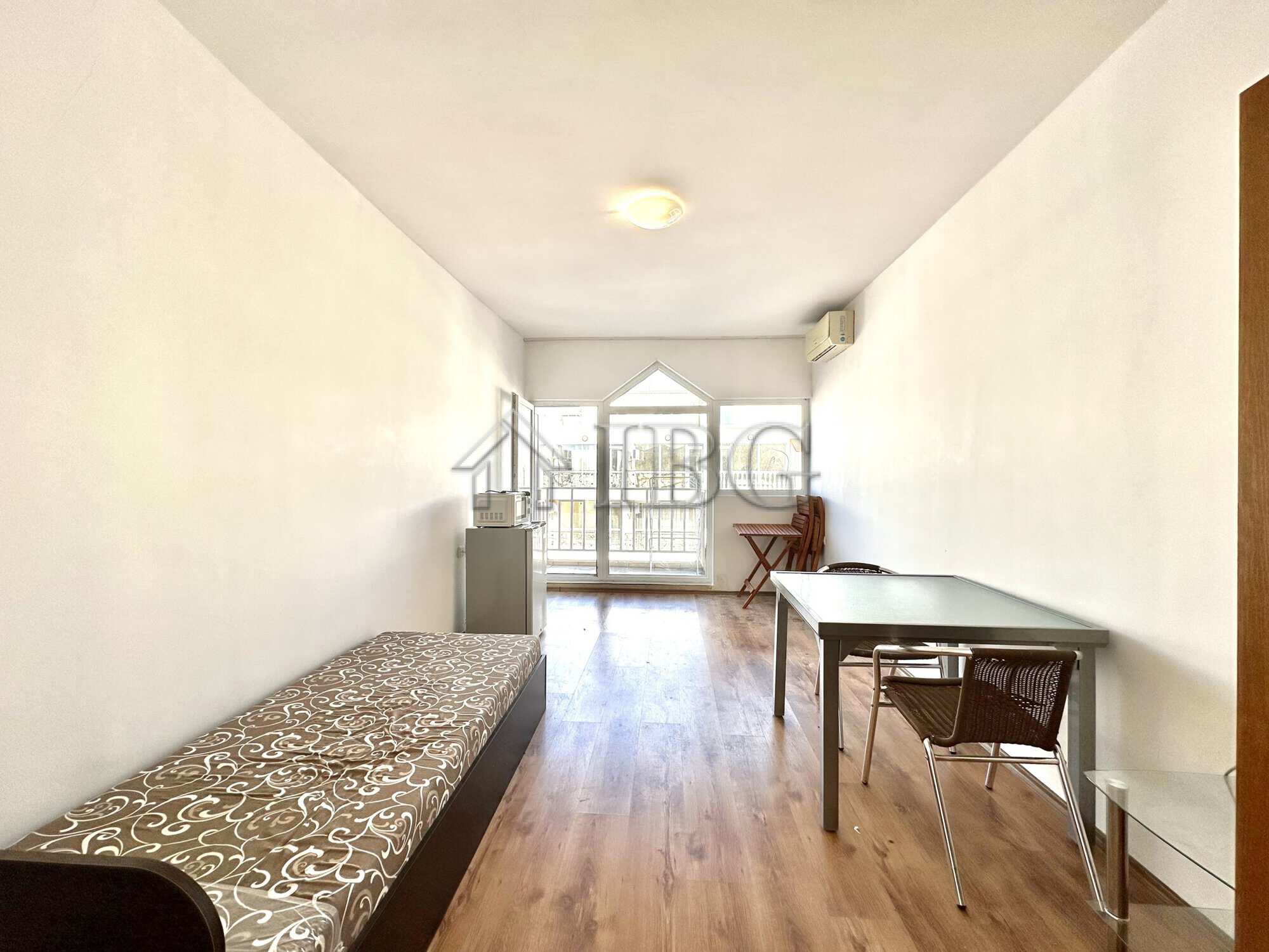 Bright studio apartment with balcony, modern furnishings, and sea views in Sunny Beach.