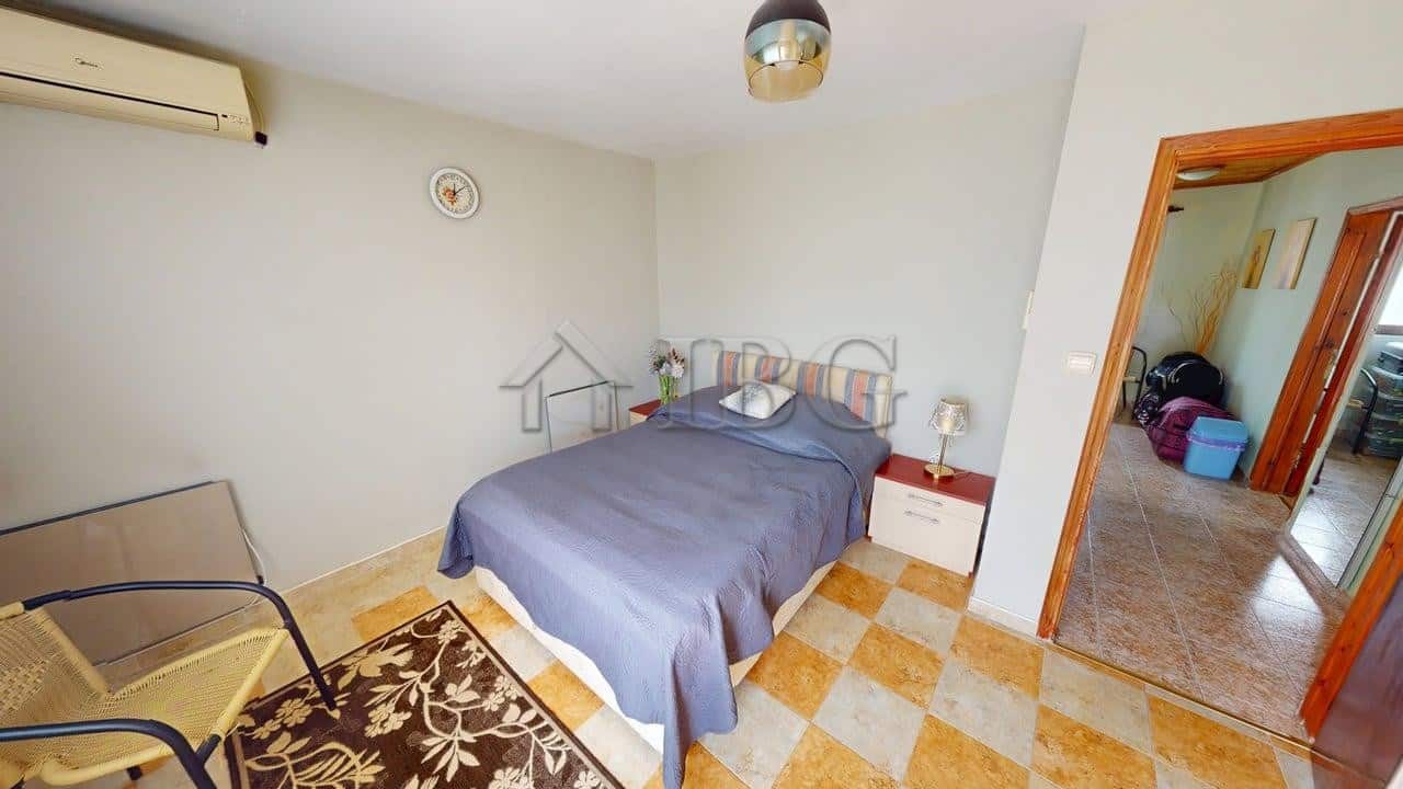 Interior view of a two-storey house in a secure gated complex in Poroy village.