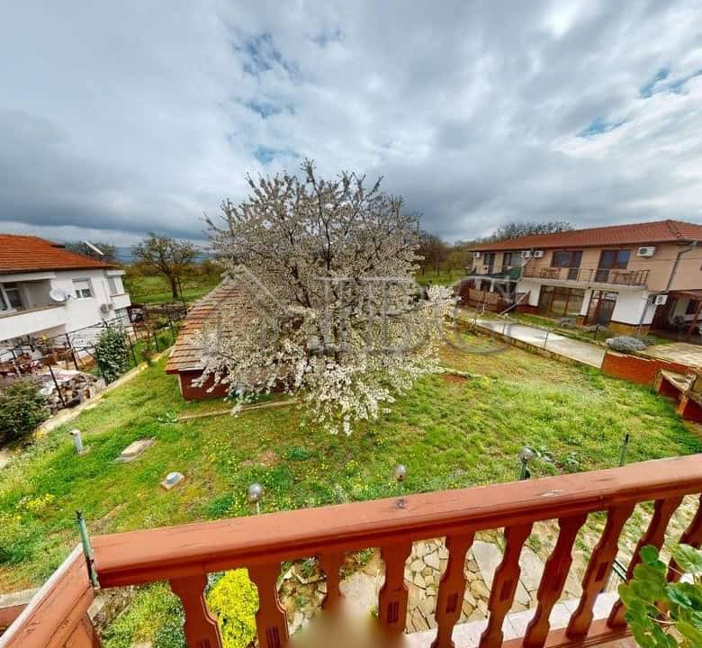 Two-storey house with garden in a secure gated community in Poroy Village.