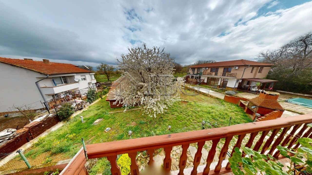 Two-storey house with garden in a secure gated community in Poroy Village.