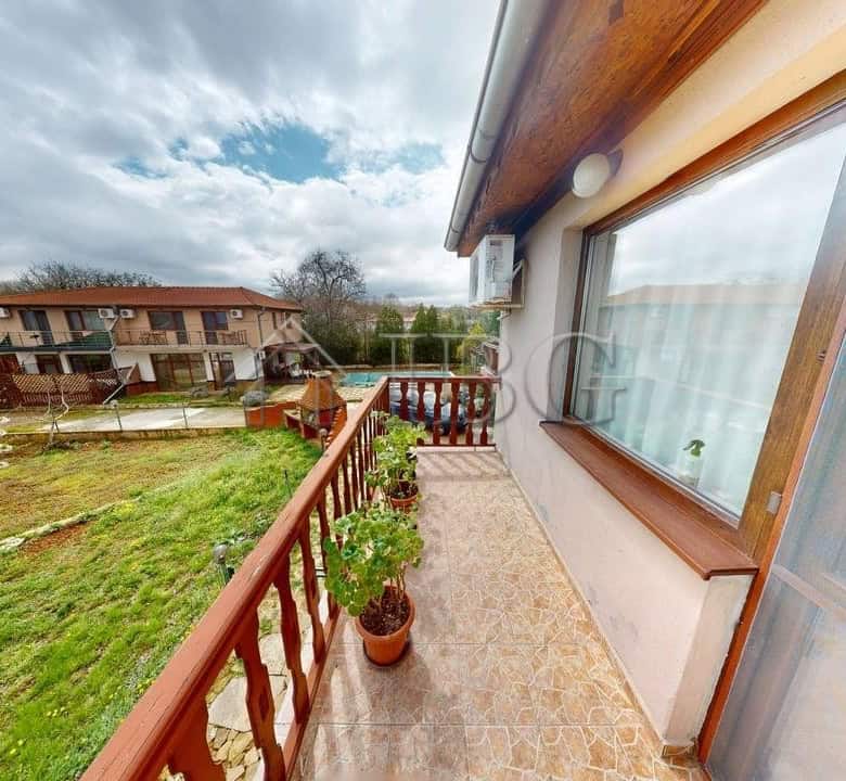 Balcony view from a two-storey house in a gated complex in Poroy Village, with scenic landscape and.