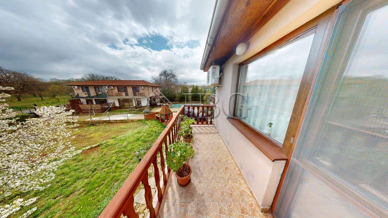 Balcony view from a two-storey house in a gated complex in Poroy Village, with scenic landscape and.