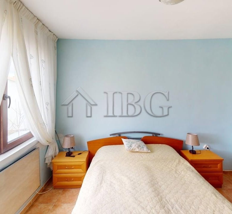 Interior view of a bedroom in a two-storey house in a gated complex in Poroy Village.