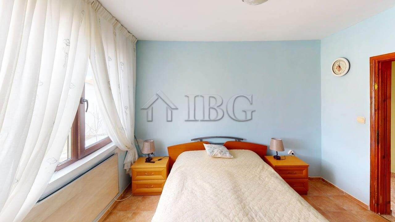 Interior view of a bedroom in a two-storey house in a gated complex in Poroy Village.